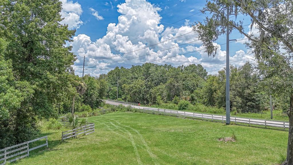 32025 Timberlake Drive Mount Dora, FL 32757 - Photo 51 of 55 a view of an outdoor space and yard