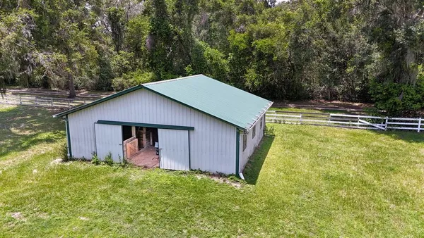 a view of empty room with floor to ceiling window