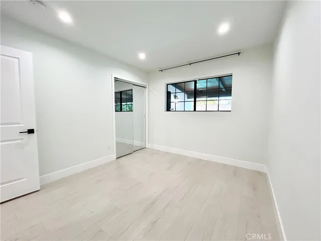 a living room with furniture and window
