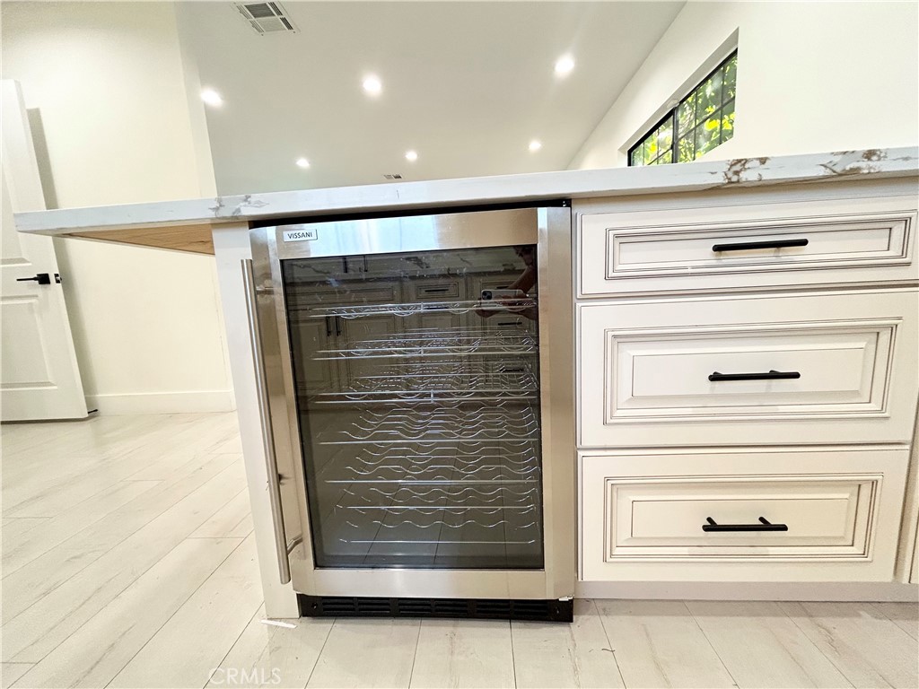 16754 Armstead Street Granada Hills, CA 91344 - Photo 3 of 28 a view of walk in closet with clothes