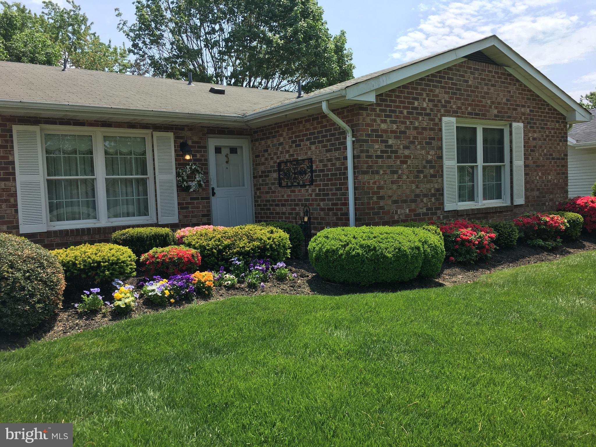 8219 Grainfield Road Severn, MD 21144 - Photo 2 of 30 a view of a house with a garden
