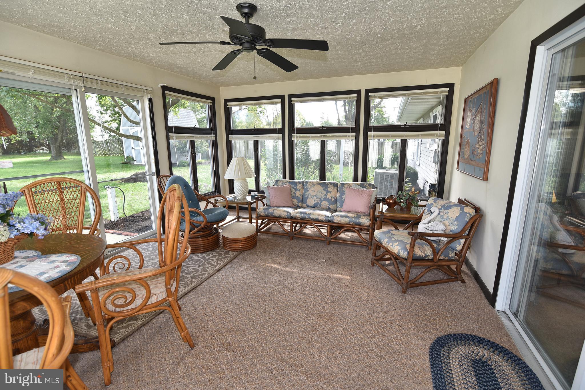 8219 Grainfield Road Severn, MD 21144 - Photo 22 of 30 a living room with furniture and a large window