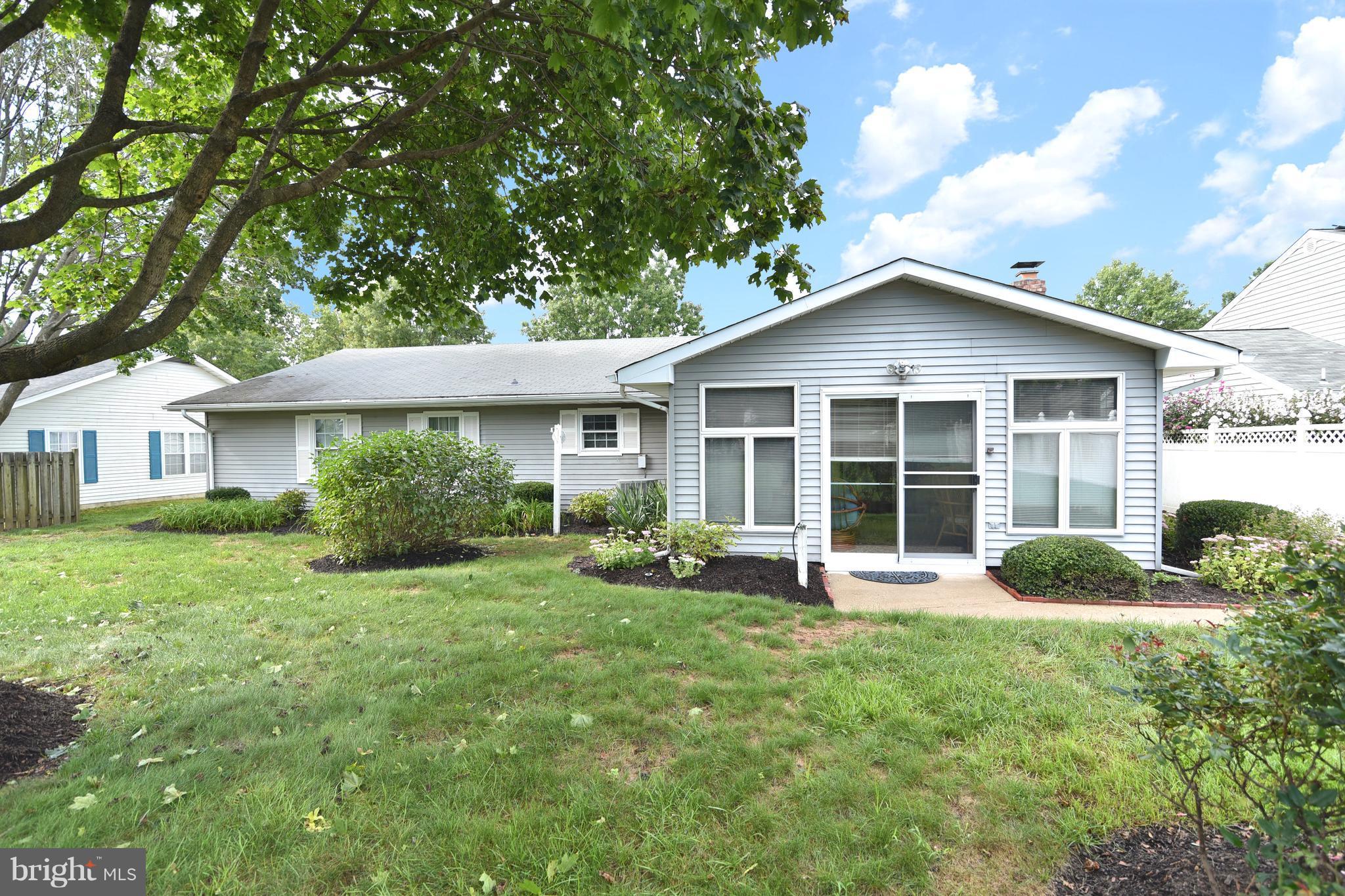 8219 Grainfield Road Severn, MD 21144 - Photo 24 of 30 a front view of a house with a yard