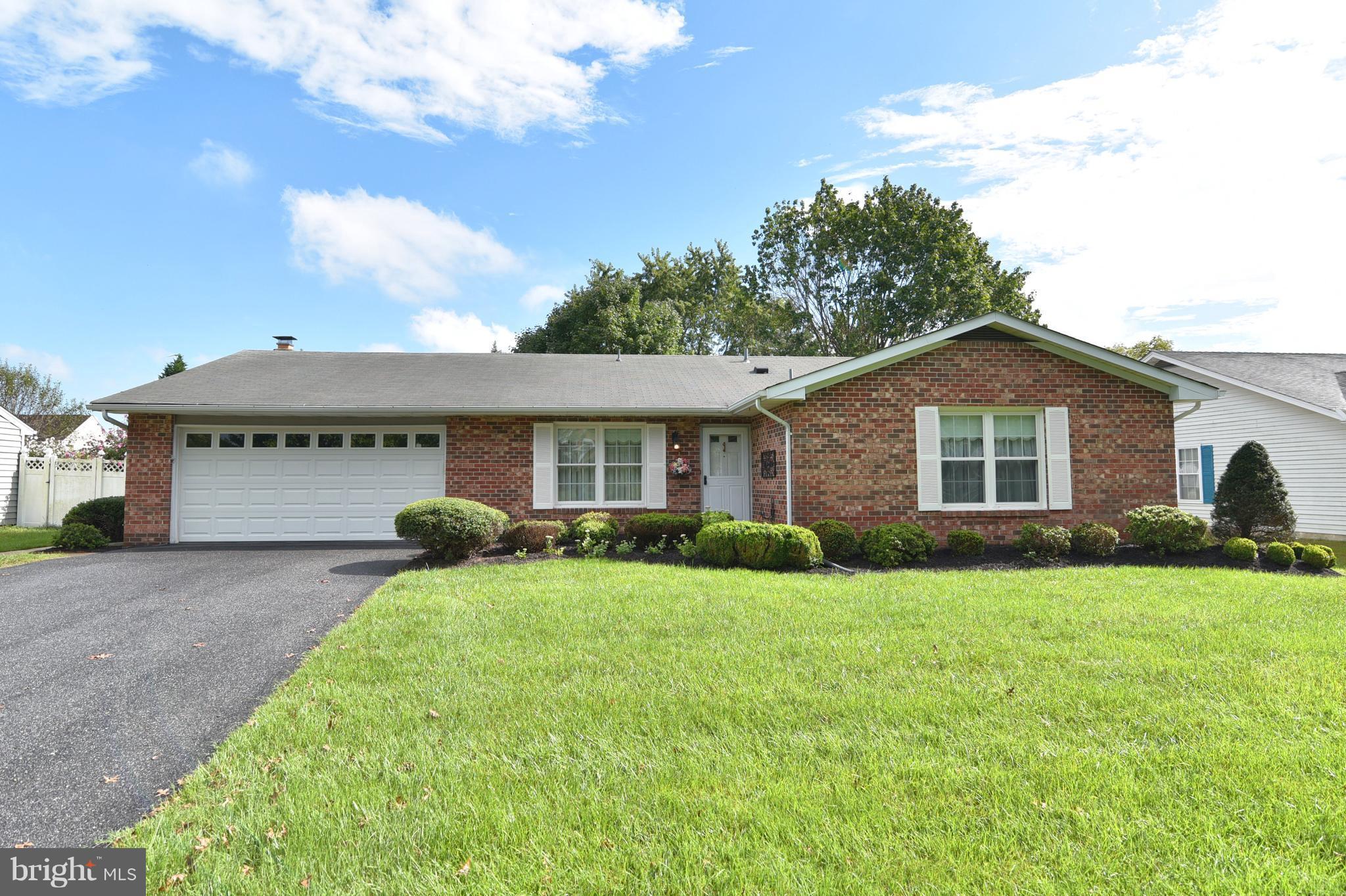 8219 Grainfield Road Severn, MD 21144 - Photo 28 of 30 a view of a house with a yard and front view of a house