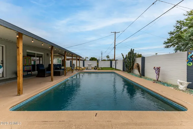 a view of a living room and bathroom