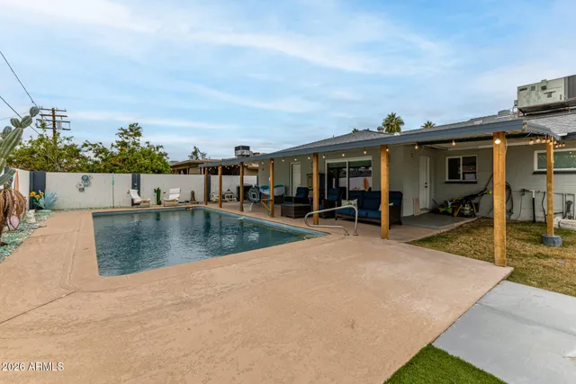 a view of a house with swimming pool