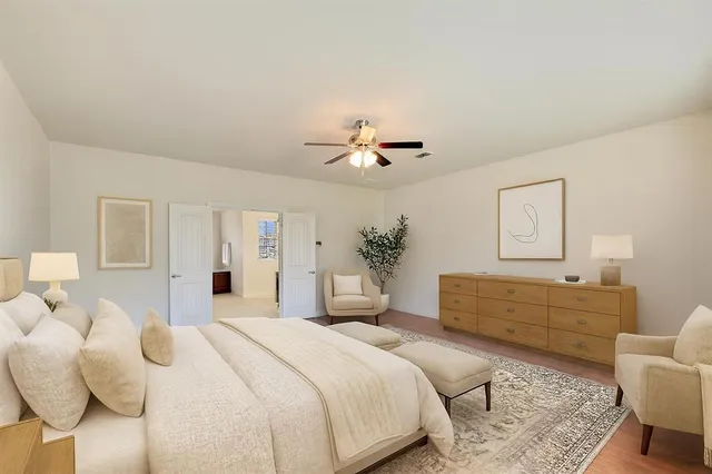 a bedroom with a bed furniture and window