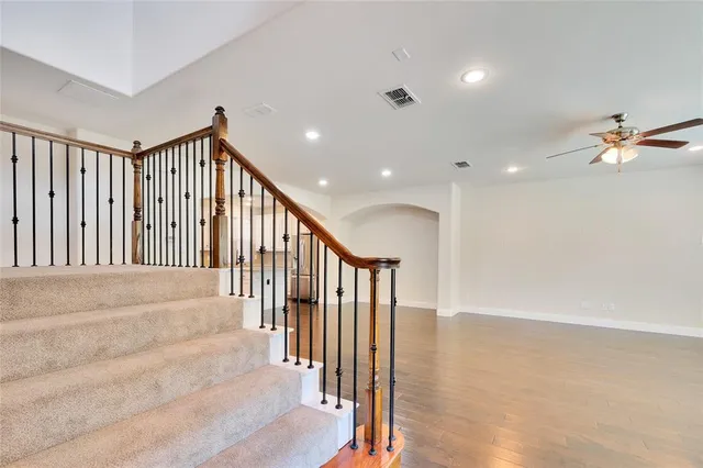 an entryway in a hall with a window