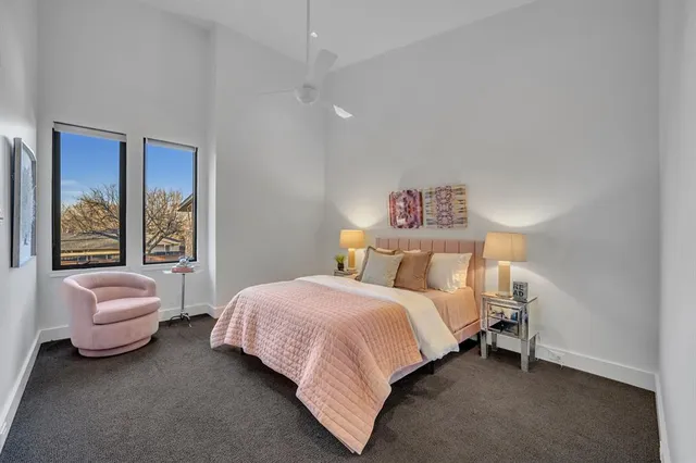 a bedroom with a bed and a couch