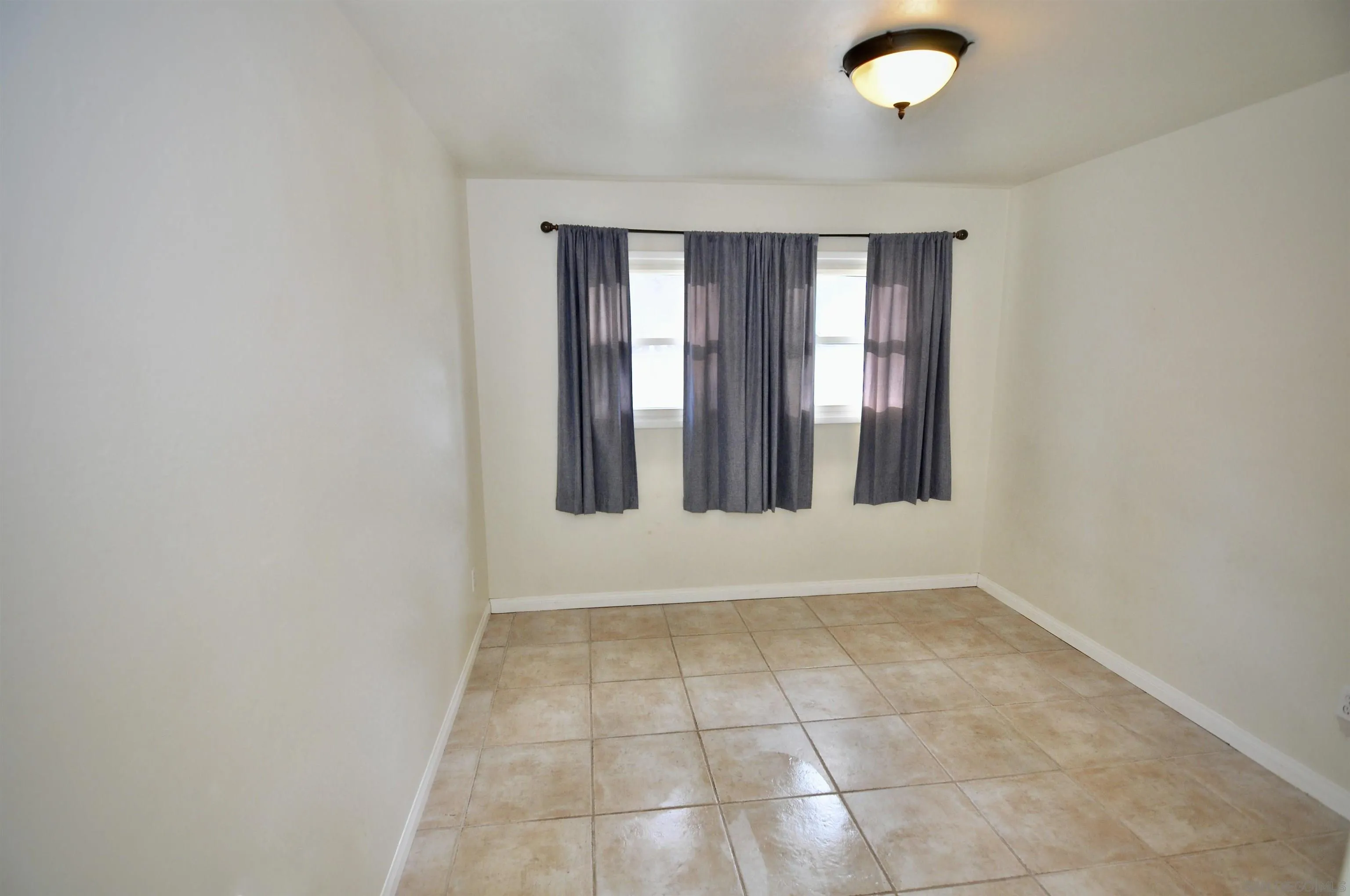 12549 Taunt Place Poway, CA 92064 - Photo 36 of 38 a view of an empty room with window