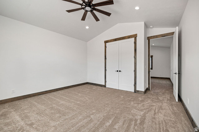 300 Knoll Loop, Unit 227 Fish Haven, ID 83287 - Photo 20 of 56 Unfurnished bedroom featuring light colored carpet, a ceiling fan, a closet, and recessed lighting