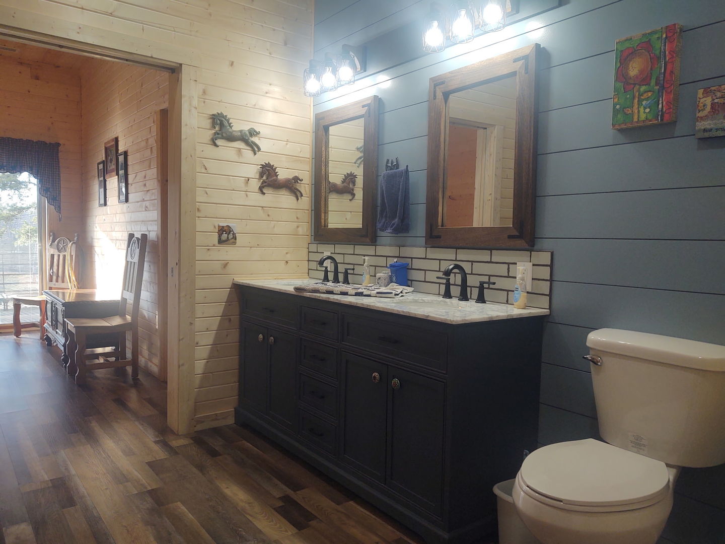 377 Lusk Road Golconda, IL 62938 - Photo 15 of 42 a bathroom with a sink vanity toilet and shower