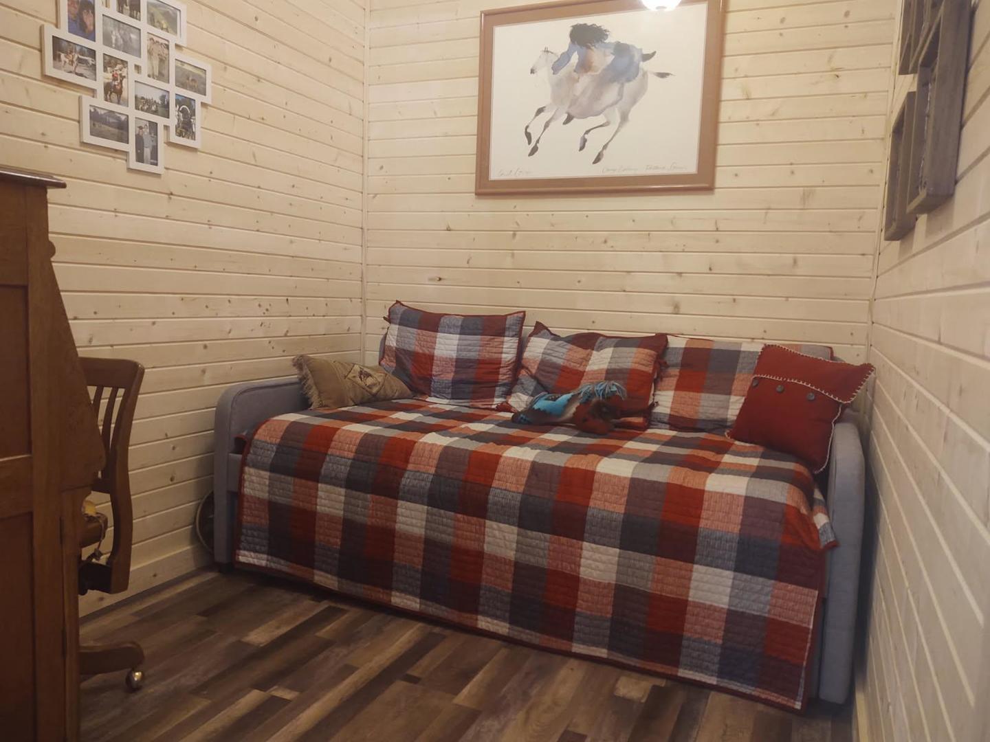 377 Lusk Road Golconda, IL 62938 - Photo 19 of 42 a bedroom with a bed and wooden floor