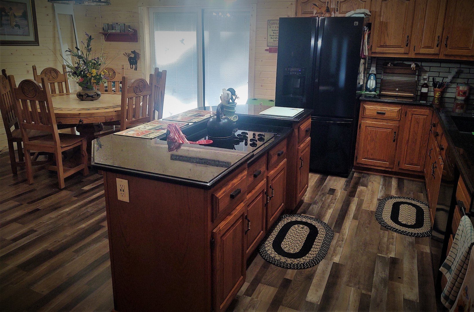 377 Lusk Road Golconda, IL 62938 - Photo 10 of 42 a kitchen that has a sink and a stove
