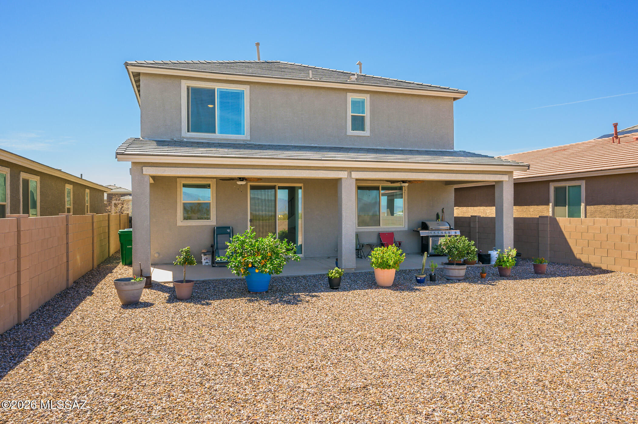 12092 East Ryscott Circle Vail, AZ 85641 - Photo 2 of 49 a front view of a house with porch