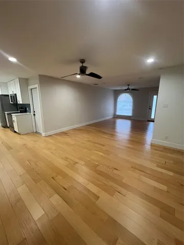 a view of a livingroom with a stove