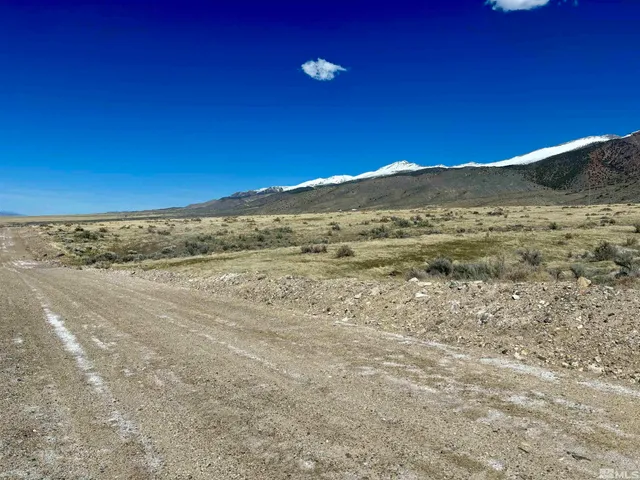 a view of beach and mountain