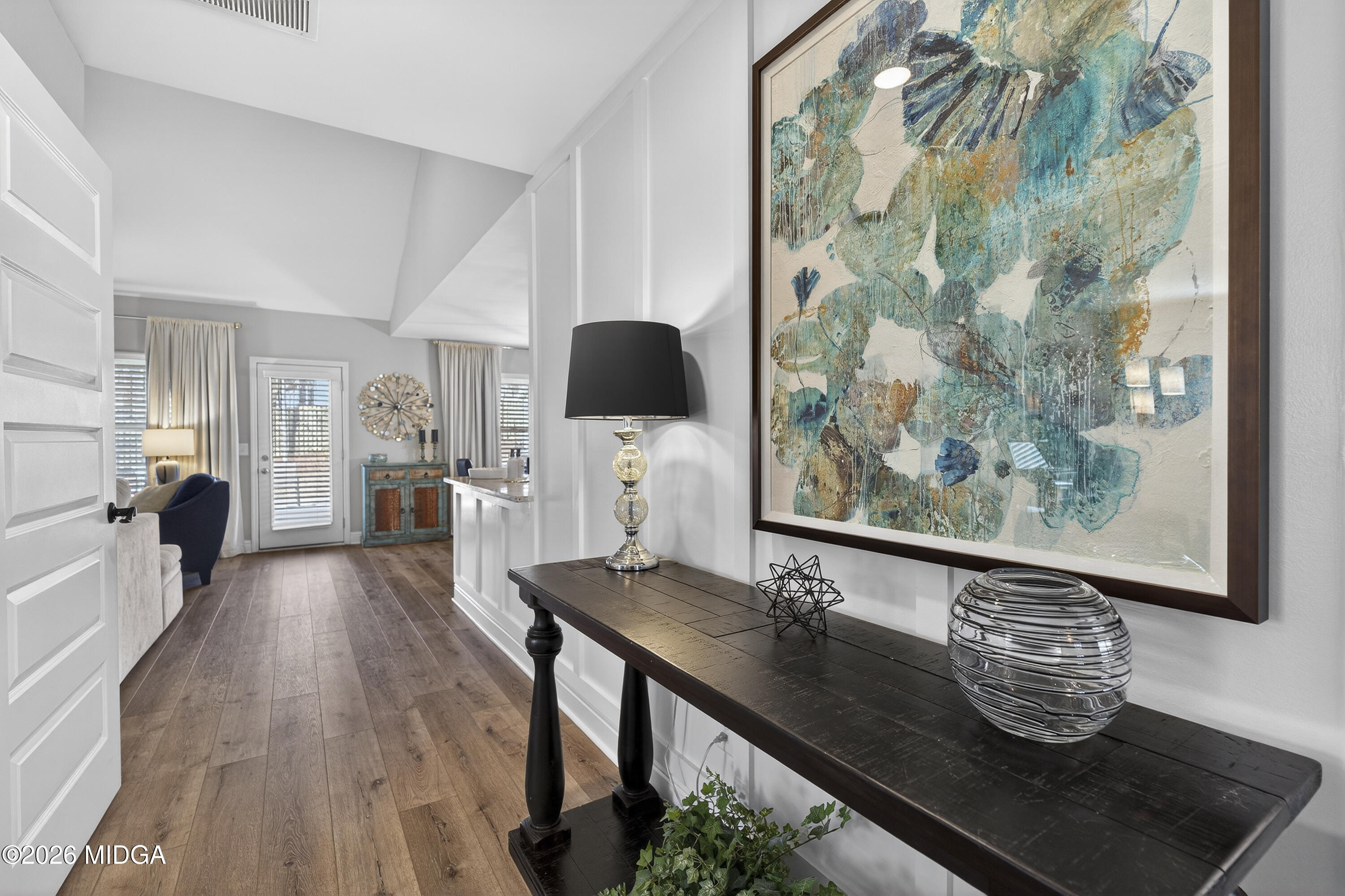 737 Springhill Drive Gray, GA 31032 - Photo 12 of 60 a living room with furniture and a fireplace