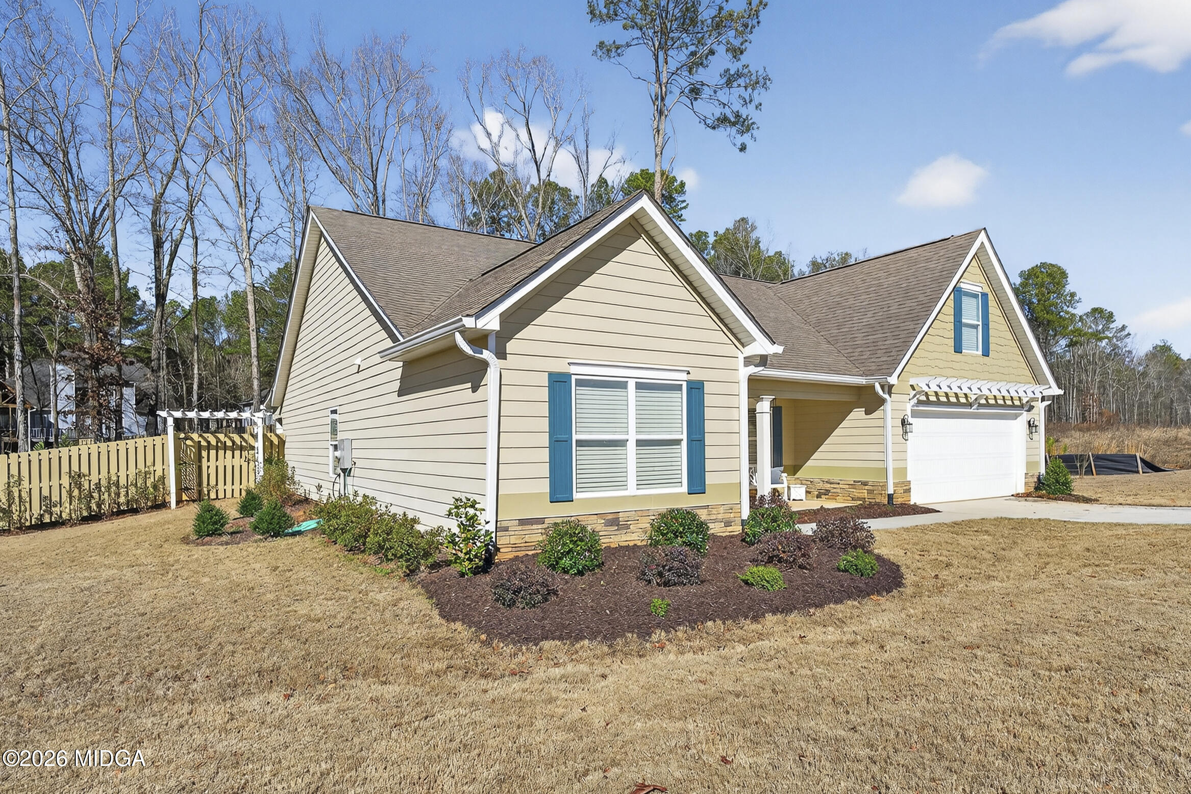 737 Springhill Drive Gray, GA 31032 - Photo 2 of 60 a view of a house with a yard and potted plants