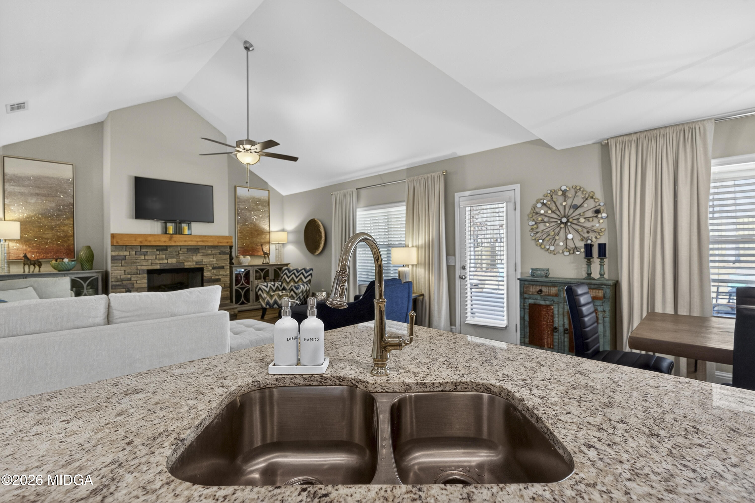 737 Springhill Drive Gray, GA 31032 - Photo 25 of 60 a kitchen with stainless steel appliances granite countertop a sink and a granite counter tops
