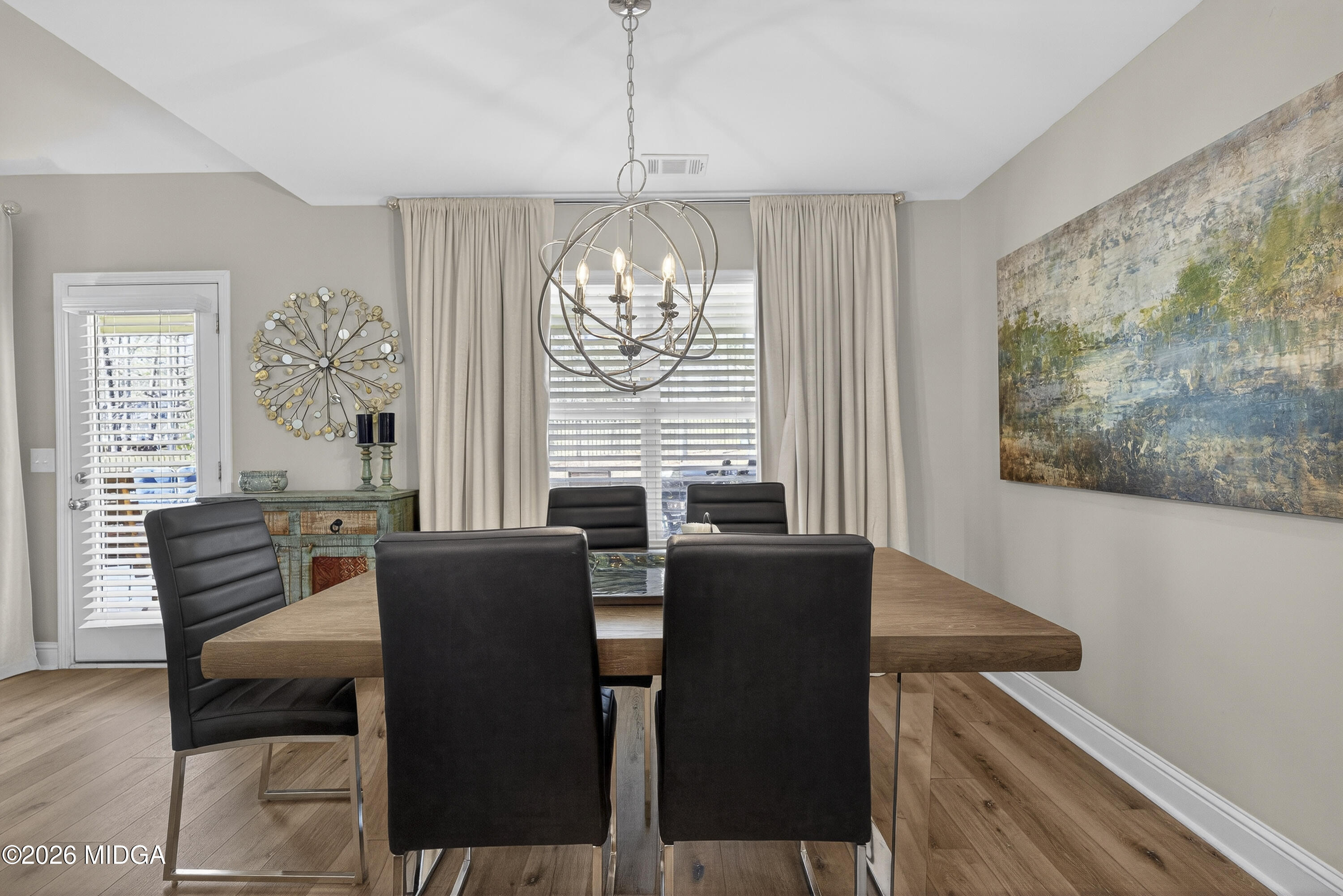 737 Springhill Drive Gray, GA 31032 - Photo 26 of 60 a dining room with furniture and window