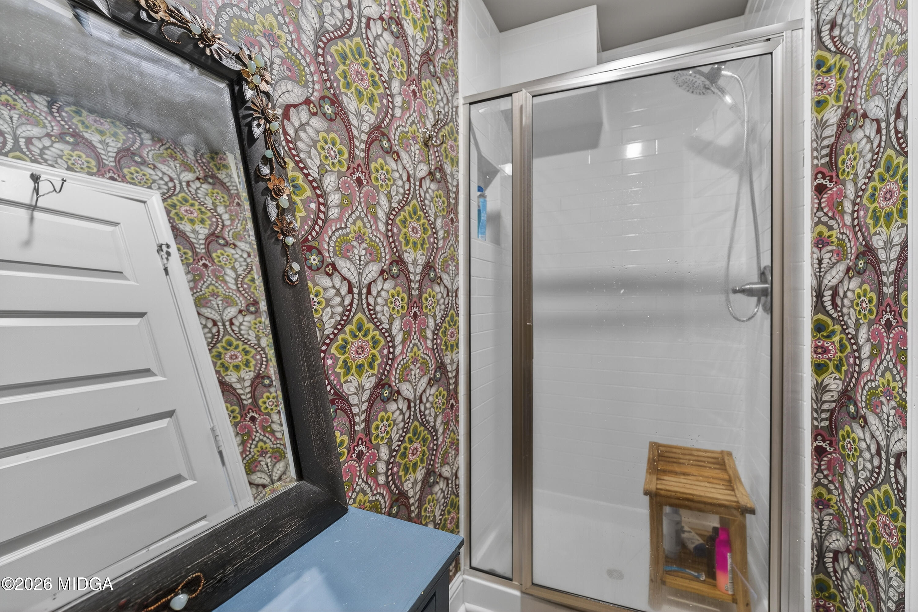 737 Springhill Drive Gray, GA 31032 - Photo 43 of 60 a bathroom with a toilet and a shower curtain