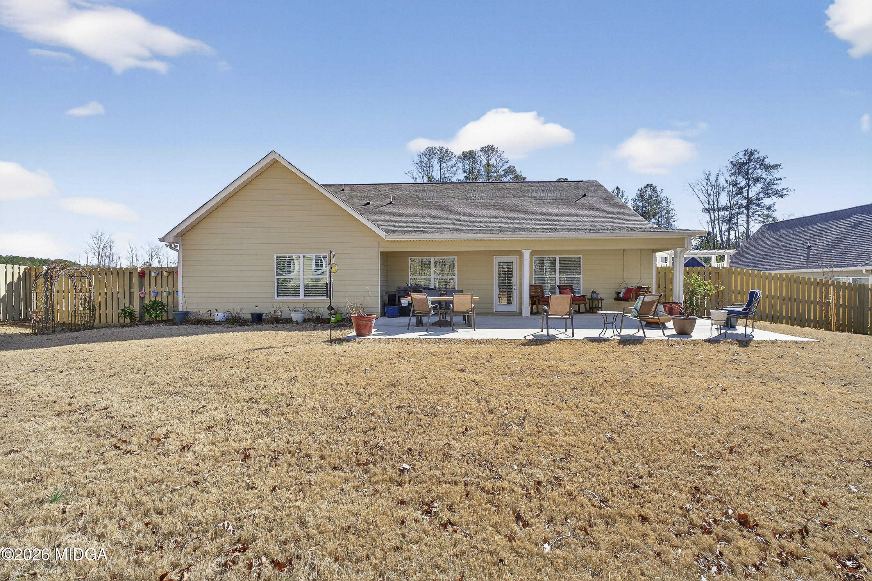 737 Springhill Drive Gray, GA 31032 - Photo 57 of 60 a view of a house with a yard and sitting area