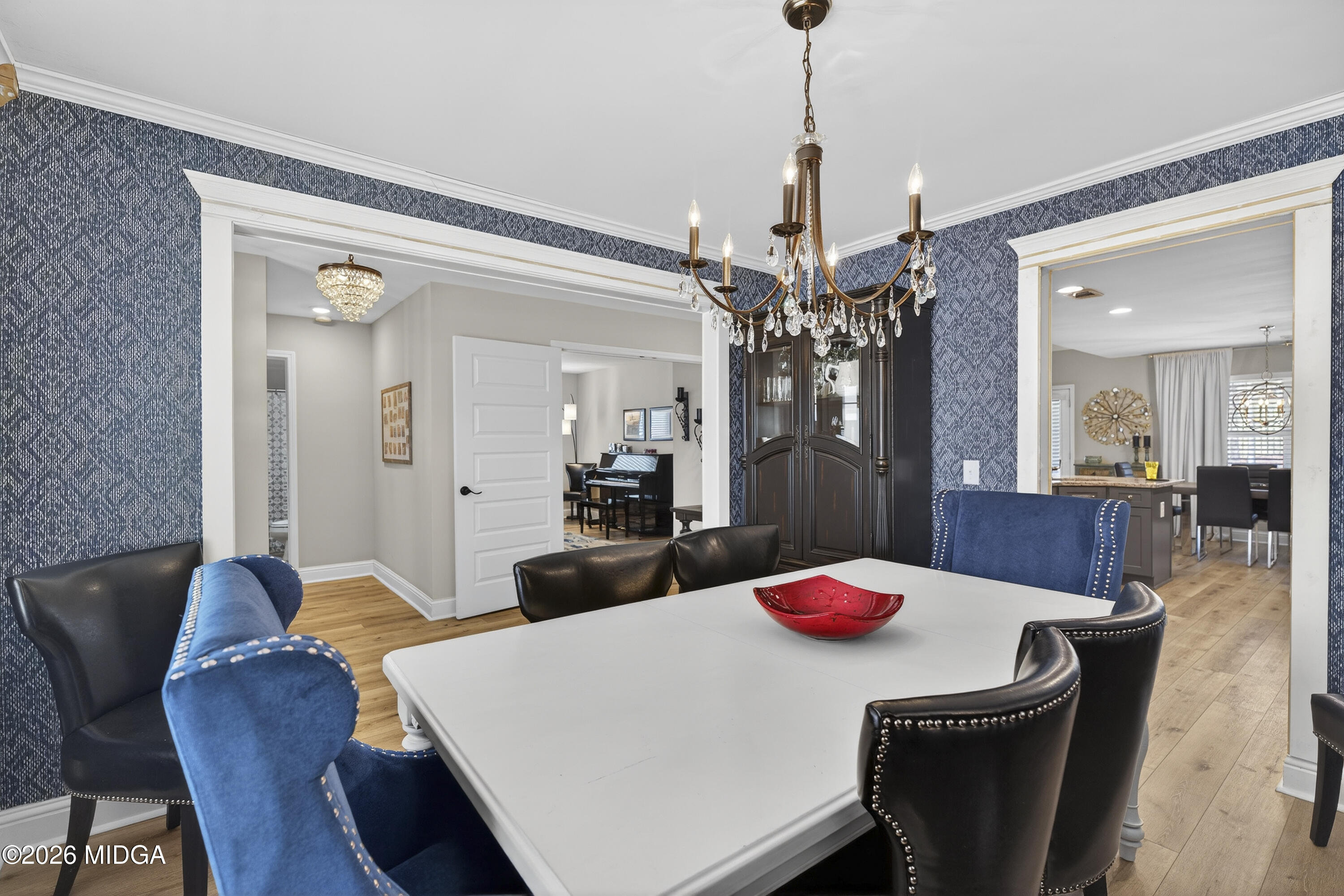 737 Springhill Drive Gray, GA 31032 - Photo 10 of 60 a view of a dining room with furniture and chandelier