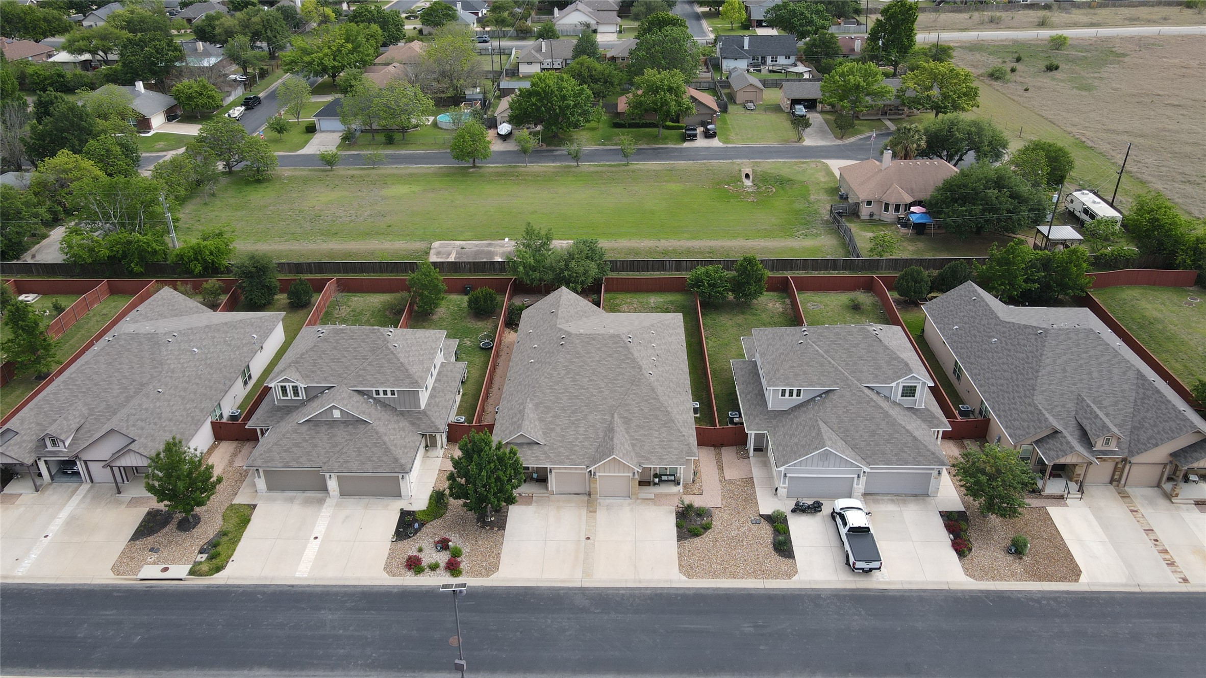 418 High Tech Drive Georgetown, TX 78626 - Photo 27 of 34 Aerial perspective of suburban area.
No rear side neighbor