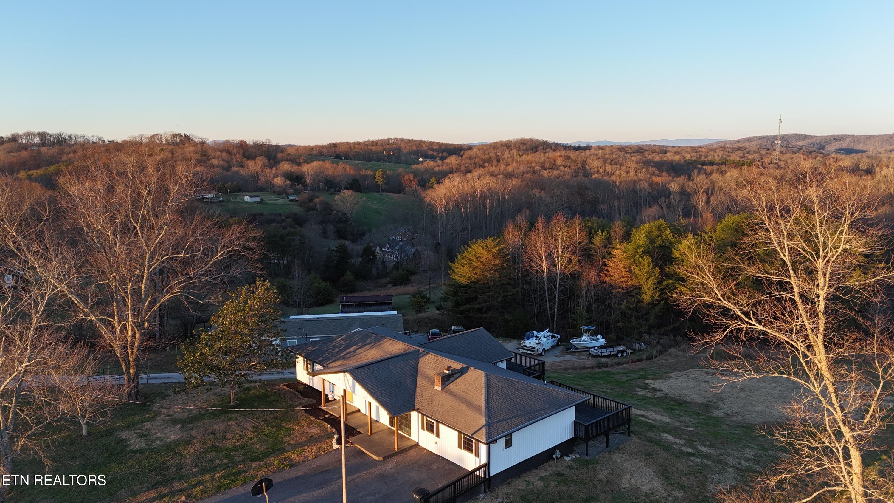 328 Peach Orchard Road Clinton, TN 37716 - Photo 3 of 46 dji_fly_20251127_173956_0141_17642812635