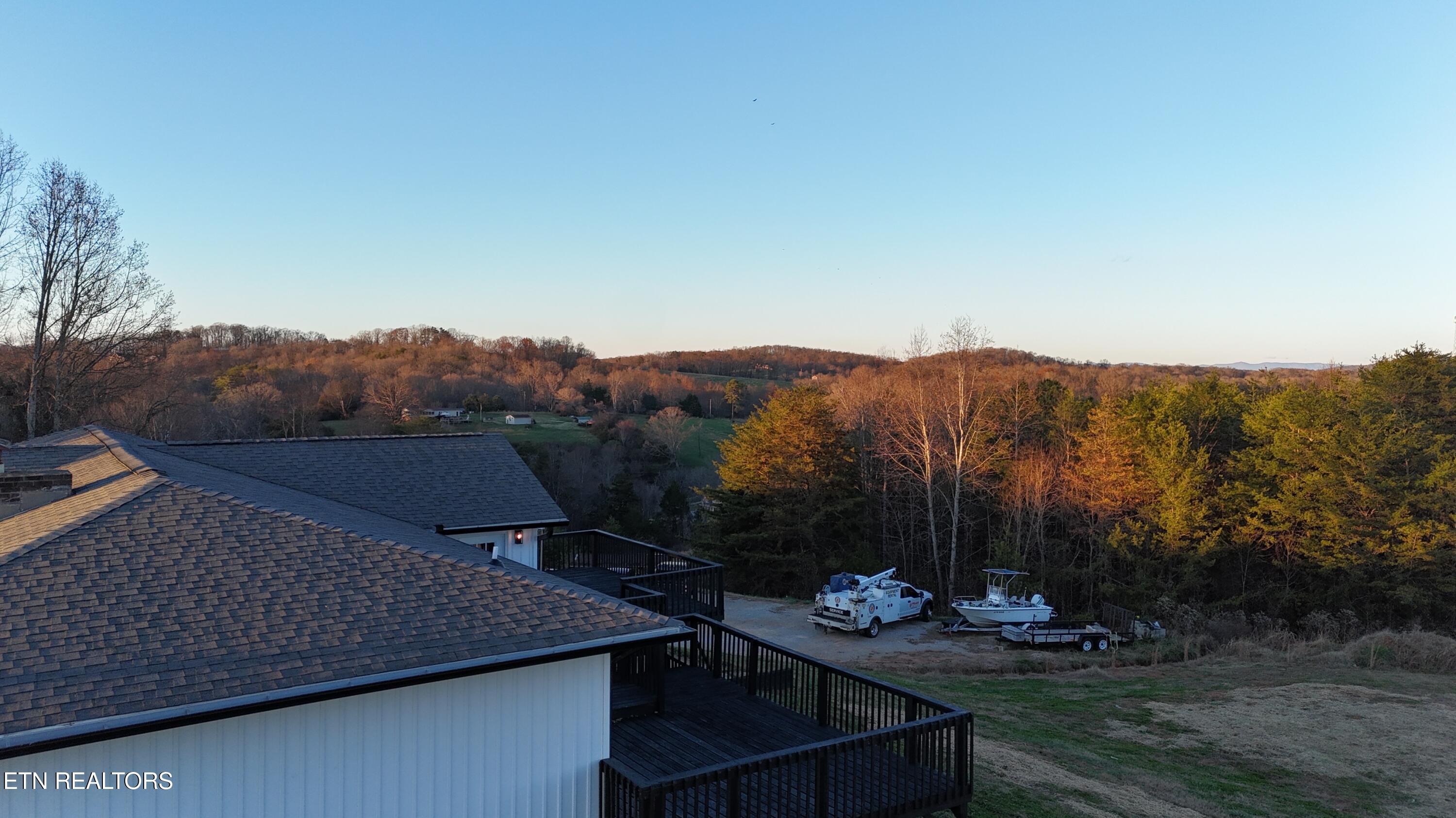 328 Peach Orchard Road Clinton, TN 37716 - Photo 4 of 46 dji_fly_20251127_173814_0134_17642812653