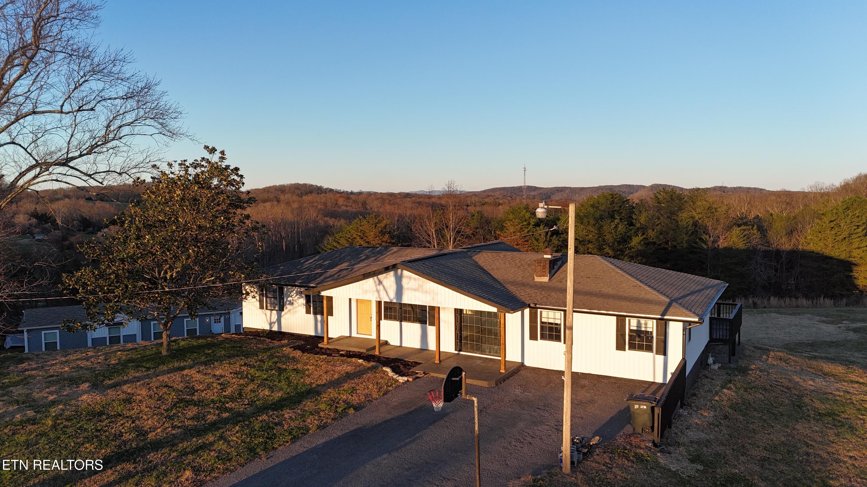 328 Peach Orchard Road Clinton, TN 37716 - Photo 6 of 46 dji_fly_20251127_173604_0127_17642812672