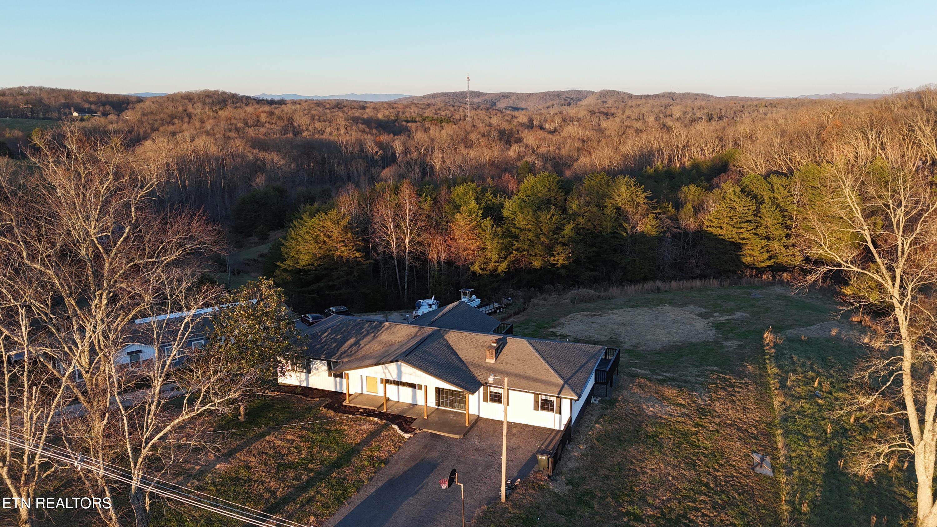 328 Peach Orchard Road Clinton, TN 37716 - Photo 8 of 46 dji_fly_20251127_173536_0125_17642812679