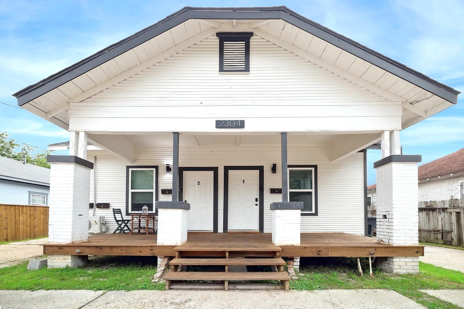 2304 Chapman Street, Unit 3 Houston, TX 77009 - Photo 1 of 17 a front view of a house with garden