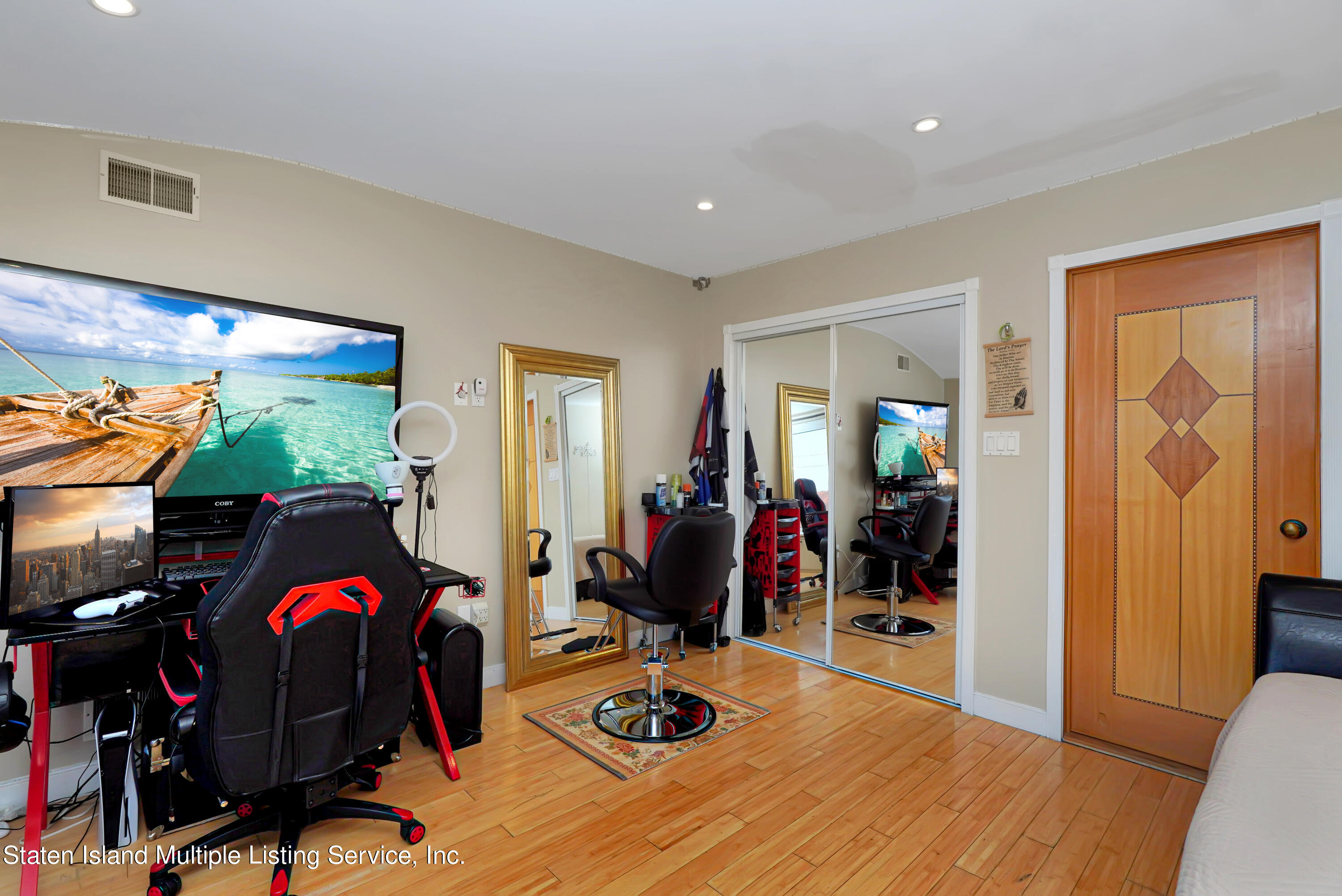 258 Edgewater Street Staten Island, NY 10305 - Photo 22 of 33 a view of a room with gym equipment