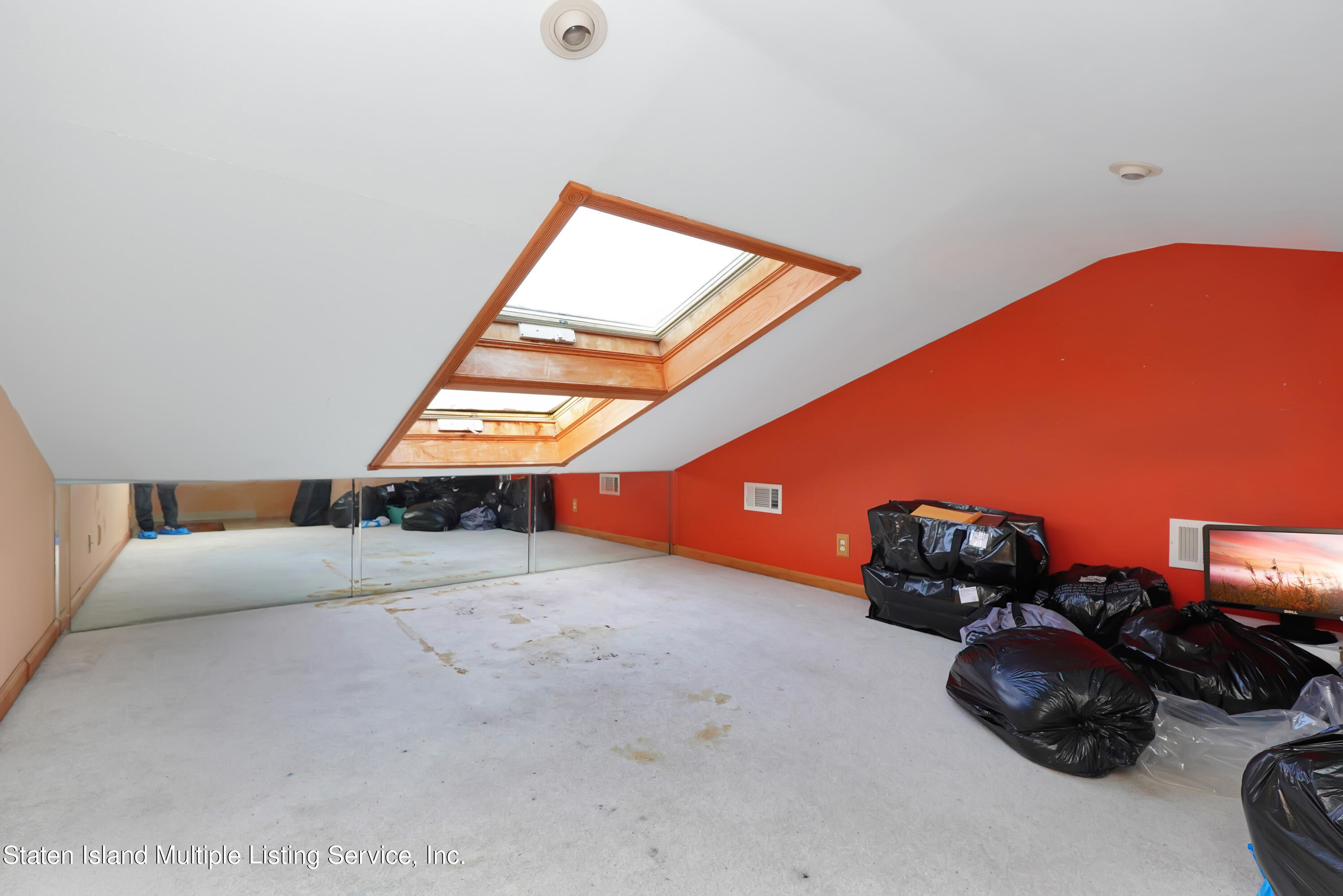 258 Edgewater Street Staten Island, NY 10305 - Photo 32 of 33 an empty room with windows