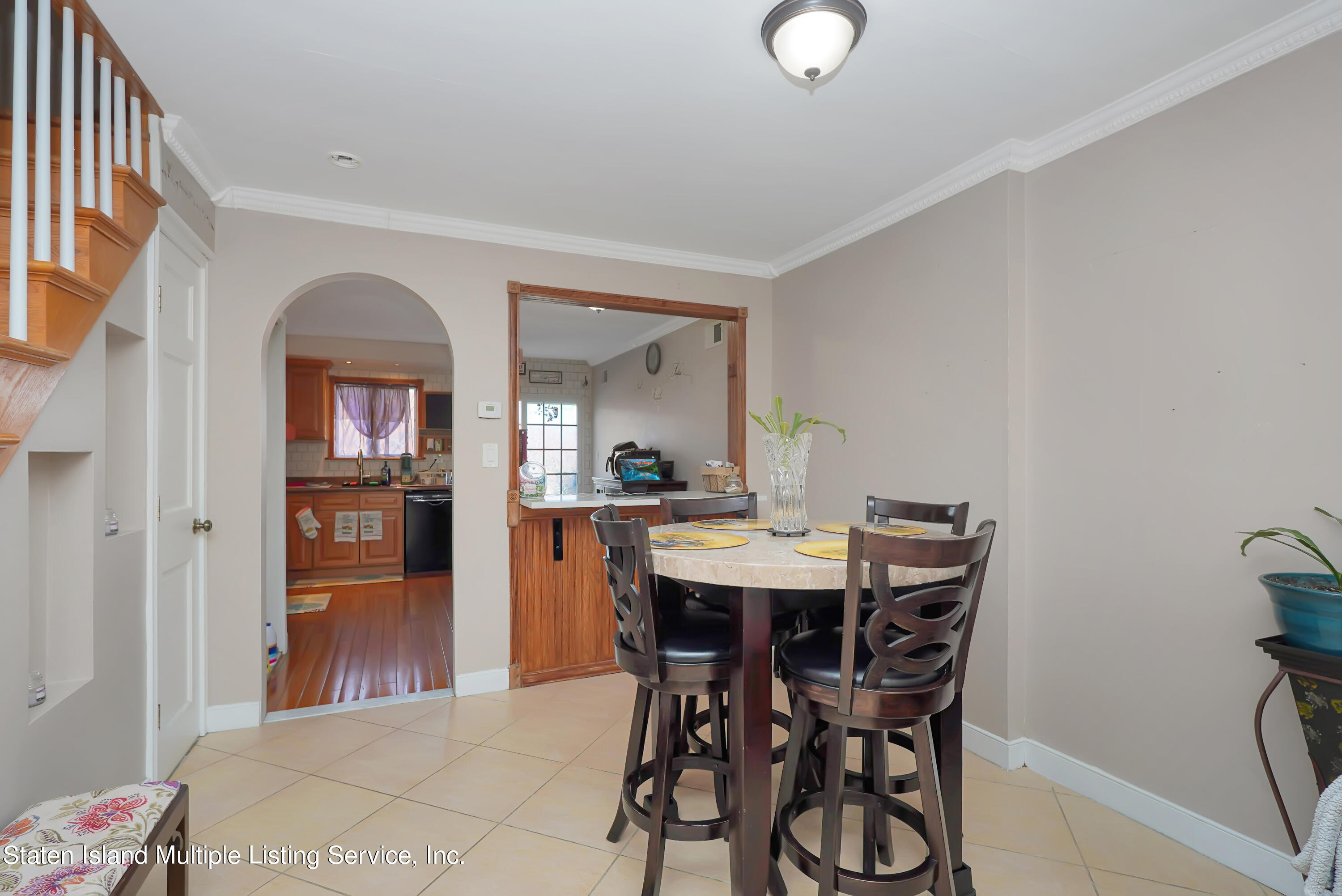 258 Edgewater Street Staten Island, NY 10305 - Photo 8 of 33 a view of a dining room with furniture