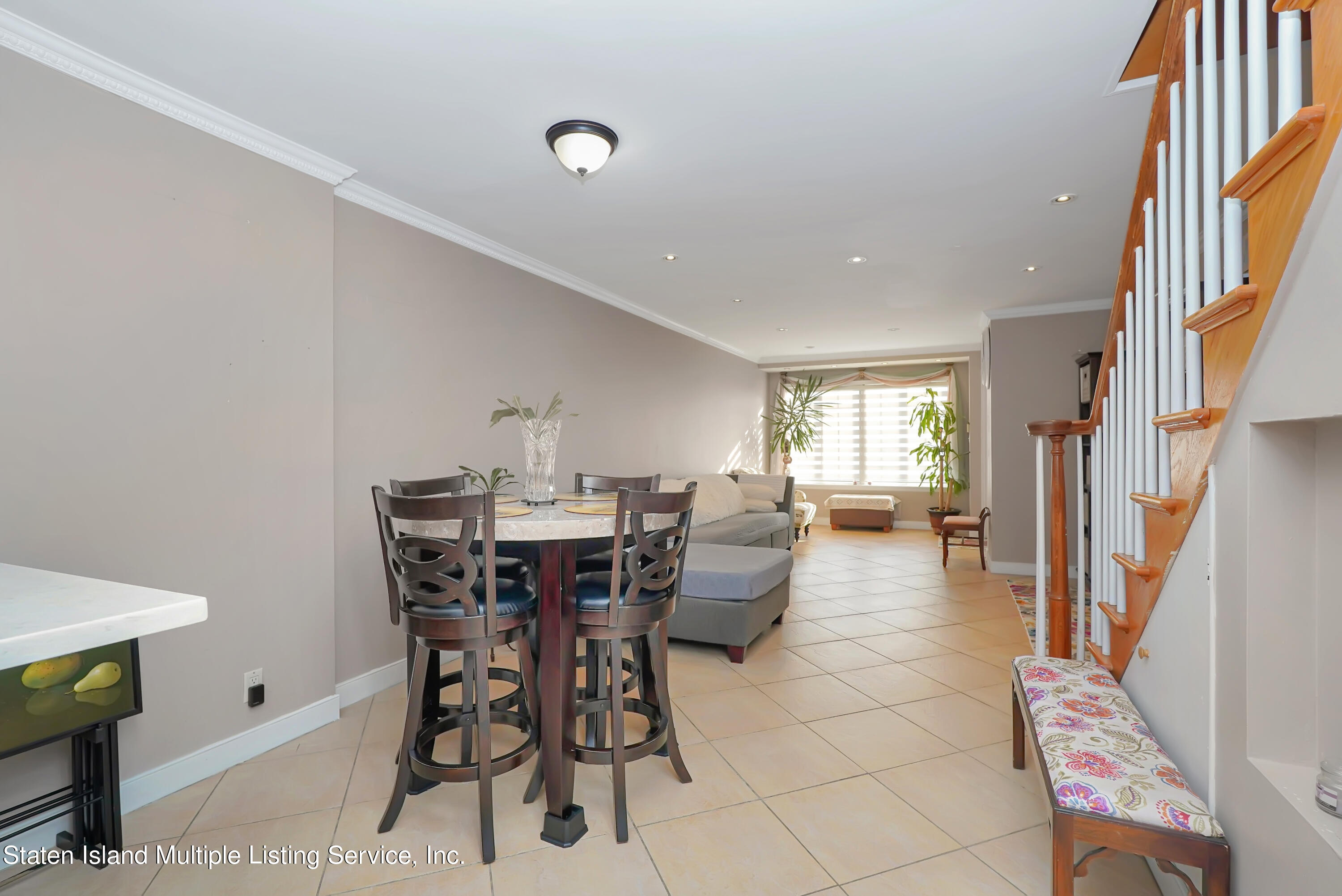 258 Edgewater Street Staten Island, NY 10305 - Photo 9 of 33 a view of a dining room with furniture