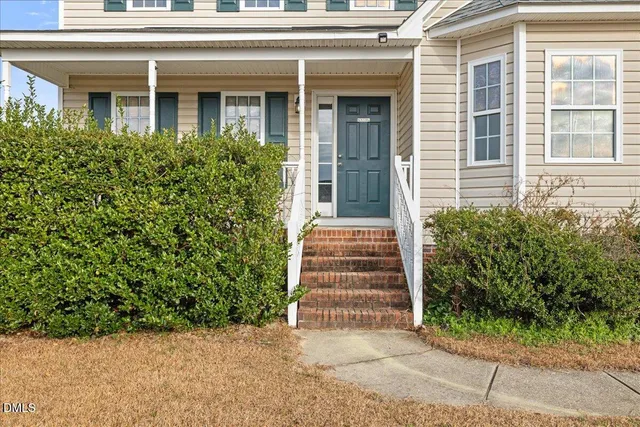 a kitchen with stainless steel appliances granite countertop a sink stove and microwave