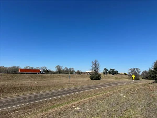 a view of a town with an ocean view
