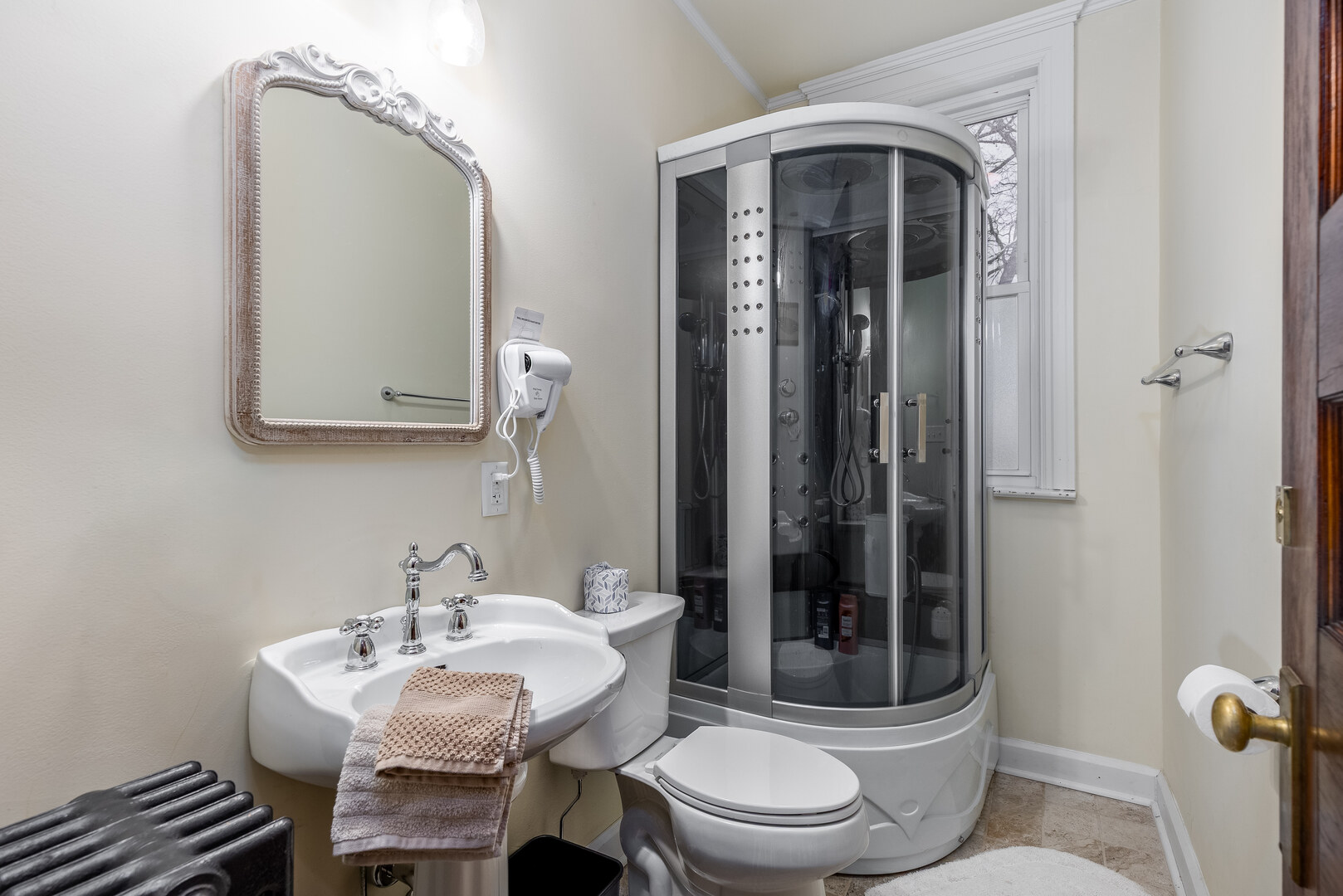 116 West Prospect Avenue Ottawa, IL 61350 - Photo 23 of 73 a bathroom with a toilet a sink and mirror