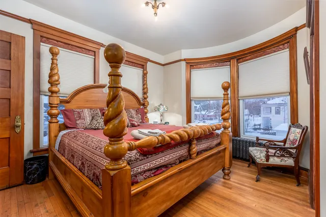 a bathroom with a shower sink and mirror