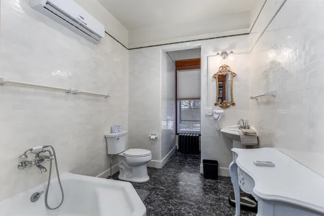 a view of a street with sitting area