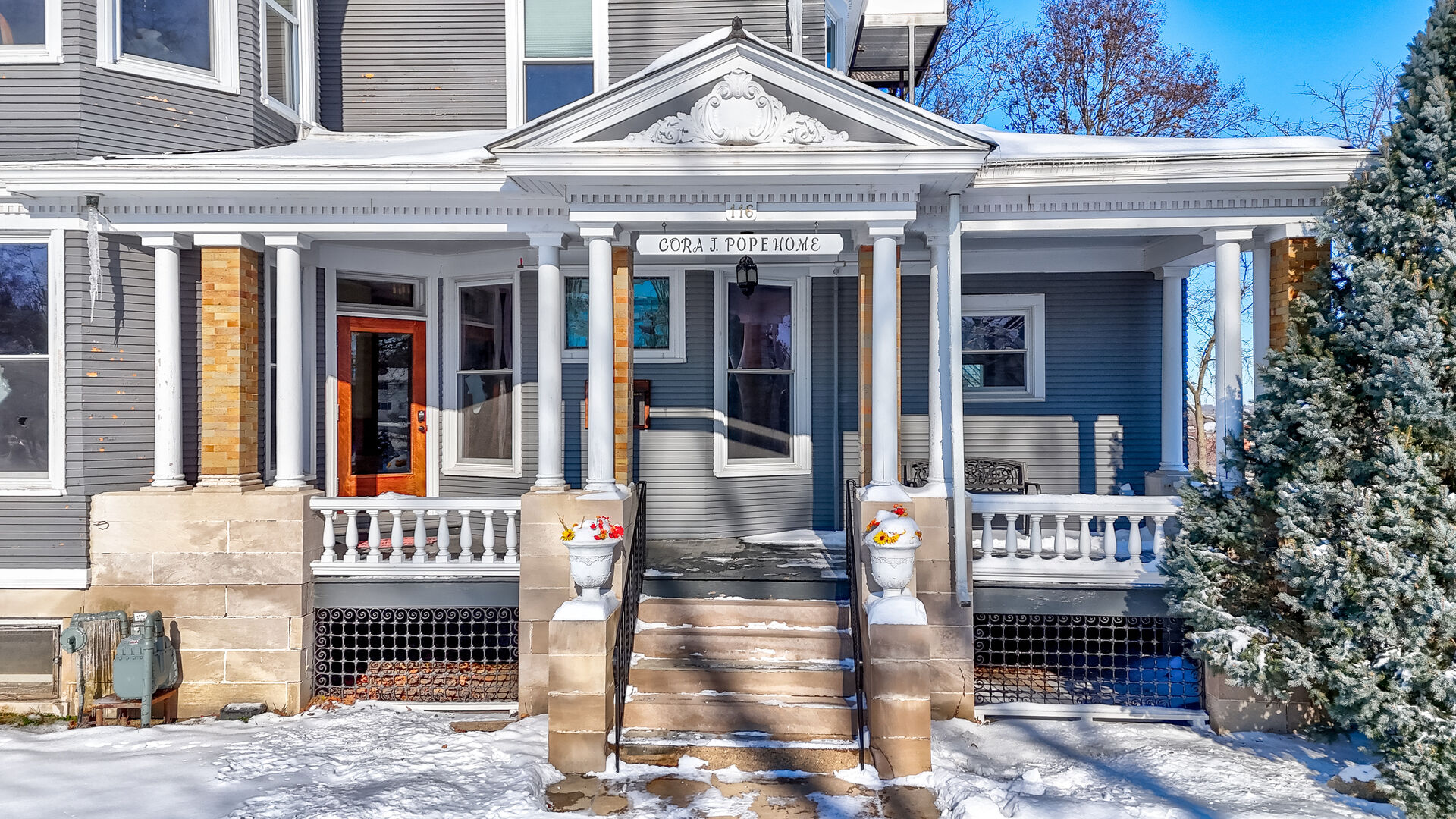 116 West Prospect Avenue Ottawa, IL 61350 - Photo 6 of 73 a front view of a building with a porch