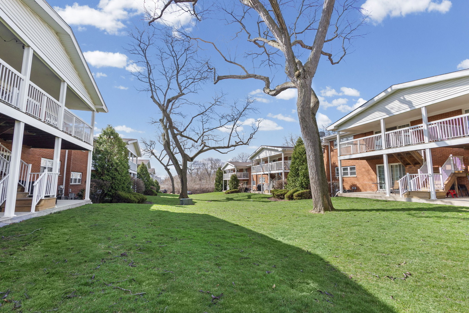 169 East Palatine Road, Unit E Palatine, IL 60067 - Photo 20 of 24 a view of building with yard