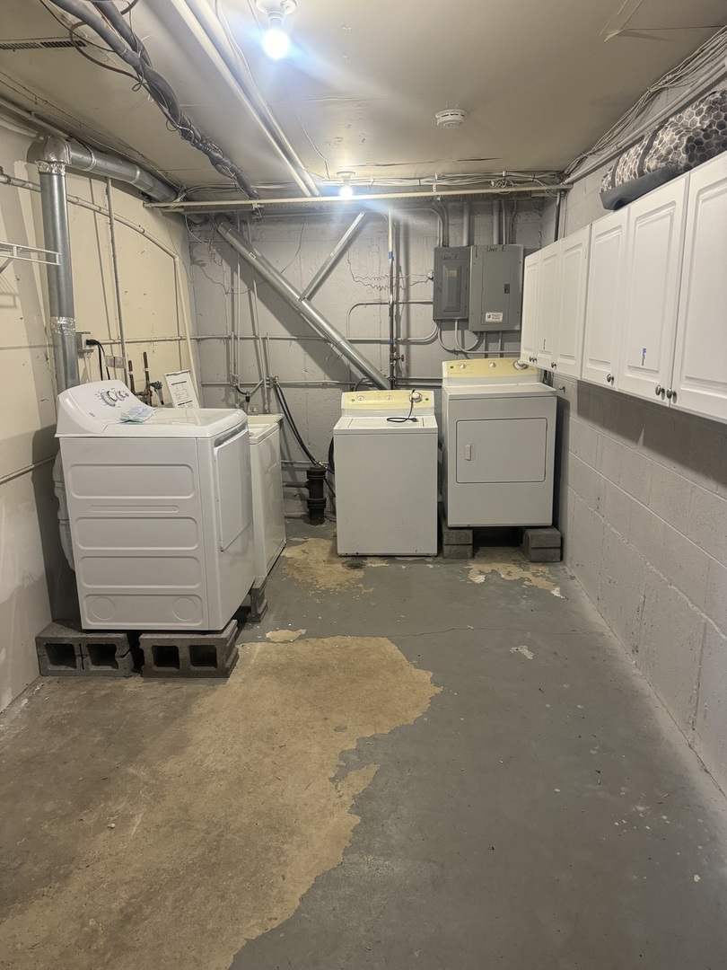 169 East Palatine Road, Unit E Palatine, IL 60067 - Photo 24 of 24 a utility room with a washer and dryer