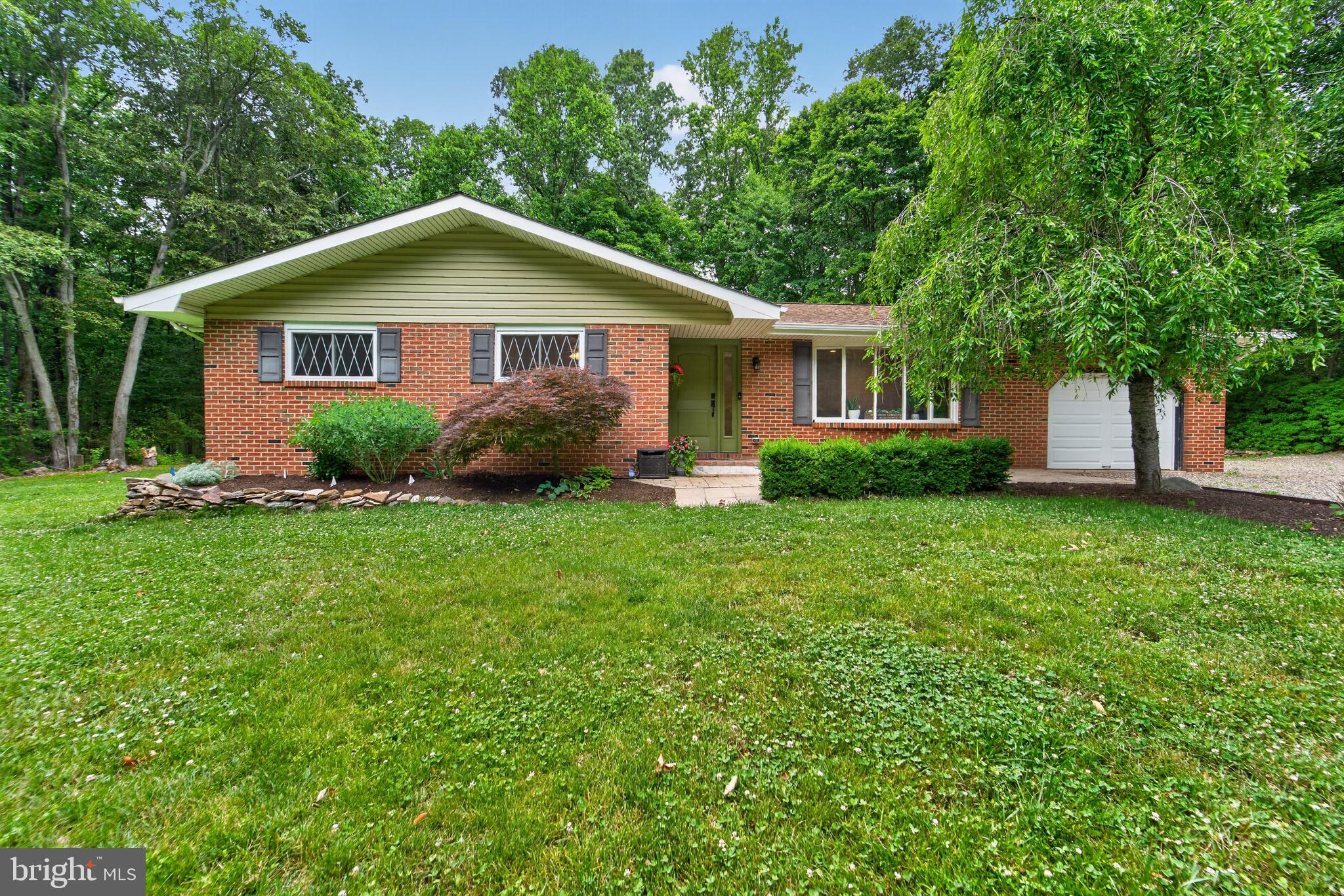 338 Woolf Road Milford, NJ 08848 - Photo 1 of 24 Charming home nestled in lush greenery.
