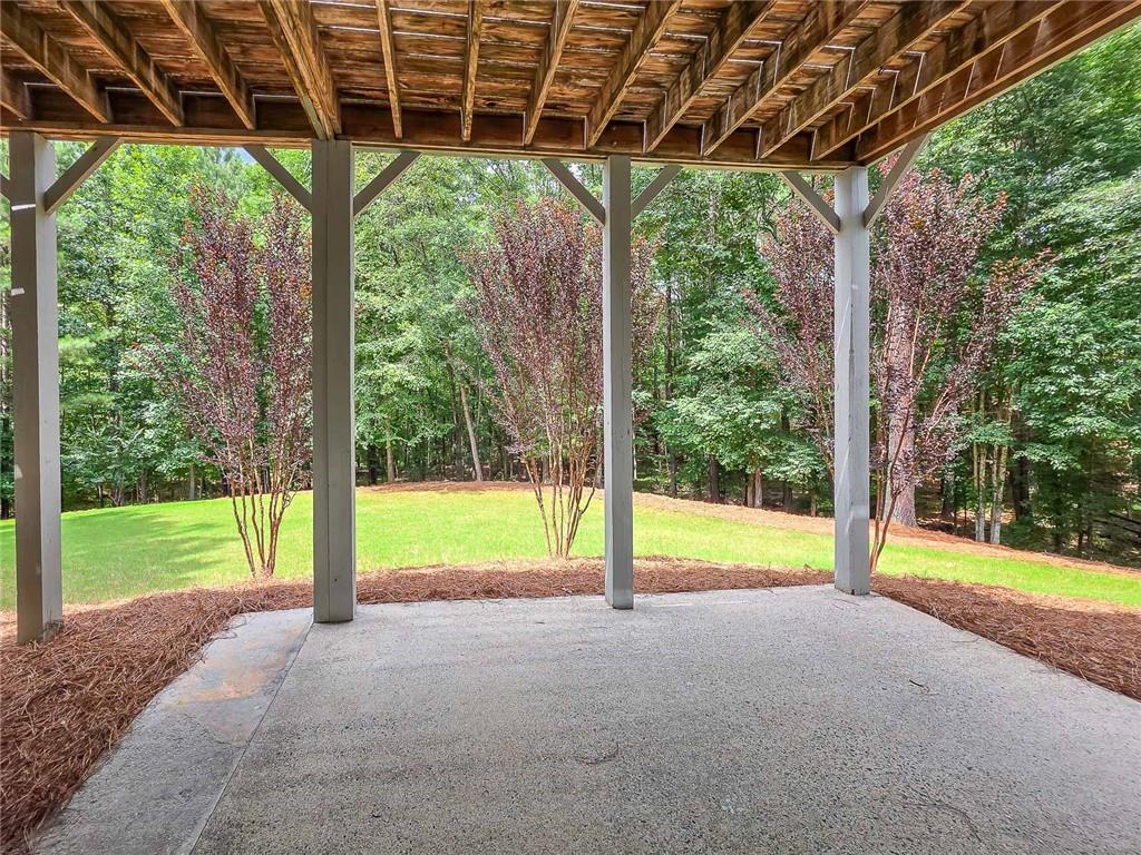 43 Ivy Mist Lane Acworth, GA 30101 - Photo 30 of 58 a view of yard with porch and garden