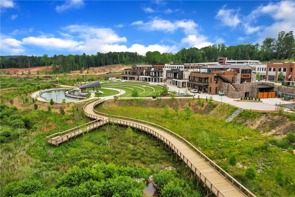 4840 Montane Street Cumming, GA 30028 - Photo 30 of 34 a view of a swimming pool with a patio