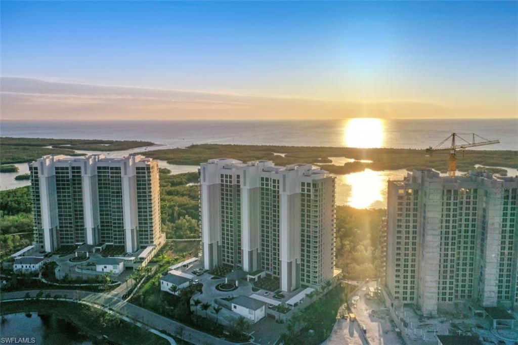 a view of a city with tall buildings in front of main door